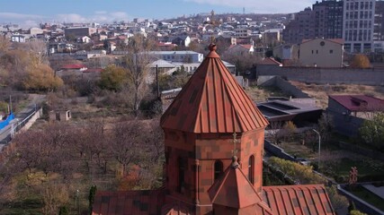 Wall Mural - Aerial view of Holy Mother of God the Mighty Church's brown domes on a sunny calm day in Armenia