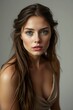 © rudy2101 - Portrait of a Young Woman with Long Brown Hair Looking Calm