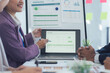 © Kritdanai - Business Team Analyzing Data on Laptop