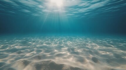 beautiful underwater view with sun rays shining through clear water