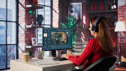 Software developer at home office coding on desktop using AI powered script, building an interface and implementing programming language algorithms. Engineer uses text to code. Camera B.
