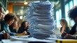 © Justlight - Bureaucrats and office workers immersed in analyzing a substantial stack of paperwork and documents on a desk, navigating tasks in a bustling modern office environment