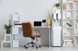 © Pixel-Shot - Interior of office with workplace, shelf unit and water cooler