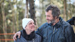 © Довидович Михаил - Two homeless people, a man and a woman, find solace in each other's company during the harsh winter months, demonstrating love and resilience amidst adversity