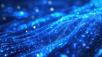 Poster - A captivating display of blue fiber optic strands, with light flowing through them, creating a dynamic visual of glowing digital connections.