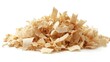 © Natchooda - A creative pile of natural wood shavings arranged on a white background, emphasizing the delicate texture and organic charm of the material.