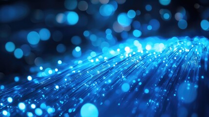 Poster - A mesmerizing close-up of blue fiber optic strands glowing in vibrant light, creating a dynamic and futuristic effect.