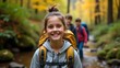 © MdNazim - Family Adventure: Parents and Children Crossing a Forest River on a Summer Excursion