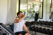 © tonjung - Man drinking water after training in gym. Healthy Concept