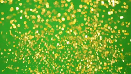 Wall Mural - Sparkling Glitter on Green: Capturing the essence of celebration with a vibrant sprinkle of golden glitter particles gracefully suspended against a vivid green backdrop.