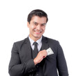 © suphaporn - confident businessman in a formal suit and tie holding a credit card, representing financial success, banking, and corporate professionalism, isolated on a transparent background