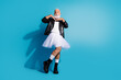 © deagreez - Photo of senior old man wearing female clothes posing look cute adorable isolated blue color background