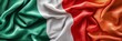 © Ilja - Close-up of Waving Italian Flag Composed from Vibrant Green, White, and Red Satin Fabric