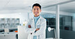 © peopleimages.com - Science, lab and portrait of Asian man with crossed arms with confidence, pride and happy for medical research. Healthcare, biotechnology and scientist for vaccine, medicine development and discovery