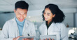 © CC/peopleimages.com - Tablet, teamwork and scientists in laboratory at night for medical research with pharmaceutical discovery. Meeting, digital technology and science professionals with report for healthcare innovation.