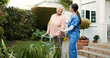 © CC/peopleimages.com - Retirement home, nurse and senior woman with walker outdoor for mobility support, healthcare and healing. Happy, caregiver and elderly person with disability for recovery, rehabilitation or fresh air