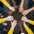 © Ayat - Group of people holding hands in unity and teamwork