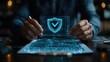 © San - Business professional holding virtual interface with document check mark and security shield icon, symbolizing simplified digital protection system in corporate technology environment