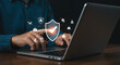 © StockWorld - Data Protection: Shield Icon, Secure Network, & Cybersecurity on Laptop. Protect Info, Home, Travel, & Privacy Online!