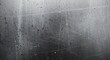 © Gabriel - Distressed metal texture with scratches and marks. A raw, industrial surface showing signs of wear and tear, creating a textured background.
