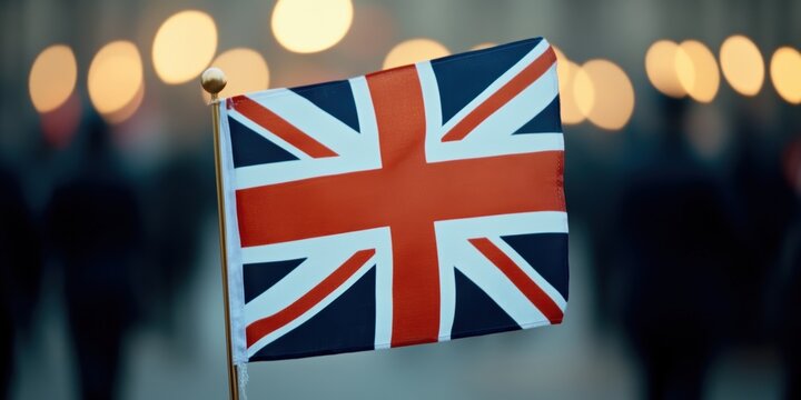 historical celebration, a detailed close-up of a waving union jack flag with blurred background of people celebrating ve day