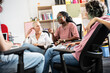 © BalanceFormCreative - In a dynamic college office, a group of students brainstorming about education, culture, human rights, and race equality.