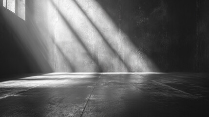 A minimalist gray empty room studio with a soft gradient, ideal for product display and background use, offering a clean and modern isolated space for showcasing items.

