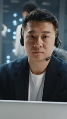 Wall Mural - portrait asian it developer administrator wearing headset speaker using laptop computer at server ra