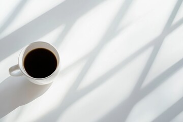 Aufkleber - Elegant minimalist view of a coffee cup on a clean white table showcasing soft shadows and refined simplicity in a serene atmosphere