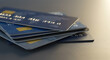 © abu - Stack of Blue and Gray Credit Cards on a Dark Surface with Golden Accents Representing Financial Security