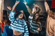 © unai - Young people dancing and enjoying a movie disco event in a cinema
