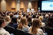 © SR Creative Idea - Diverse Audience at a Large Business Conference or Seminar