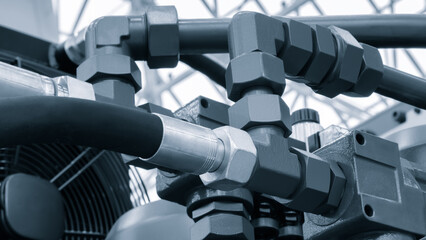 Aufkleber - Bundle of pipes connected to industrial hydraulic pneumatic machine, industrial concept background