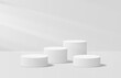© Stock Cp - Soft realistic white 3d cylinder podium in lighting room shining on pedestal elegant. 3D vector stage for product mockup. Geometric platform. Vector rendering. Minimal scene for product promotion.