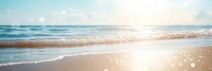 Wall Mural - serene coastal landscape with soft golden sand, gentle waves, and sparkling sunlight creating a tran