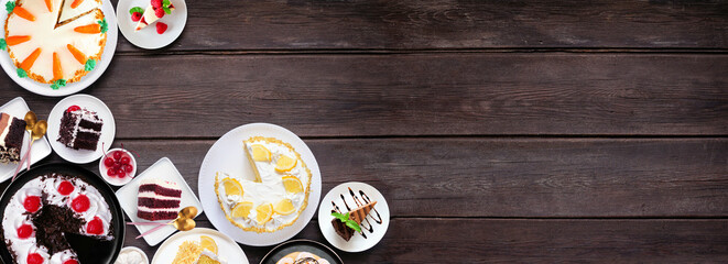 Fototapete - Dessert corner border with a variety of cakes. Above view over a dark wood banner background. Copy space. Black forest, lemon, carrot, red velvet, chocolate and cheesecakes.