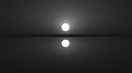 full moon reflecting on quiet lake surface under nig