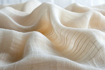 Aufkleber - The image depicts a close-up shot of soft, flowing, and slightly textured beige fabric in gentle folds and curves.