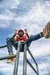 © FATIR29 - A young man poses on a metal railing