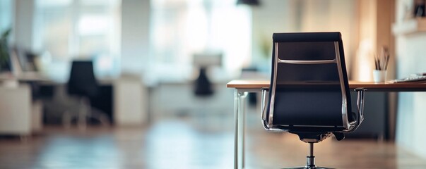 Aufkleber - Empty office chair sitting at desk in quiet open plan workplace