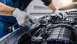 © 솔이 최 - A mechanic working with tools on the car bonnet