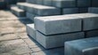 © Sawat - Pile of concrete blocks stacked on top of each other, with rough textures and edges visible