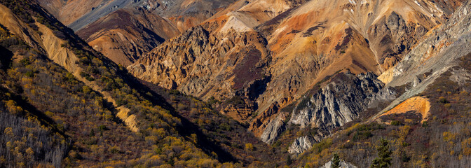 Wall Mural - panoramic view of red sandstone mountain landscape in alaska