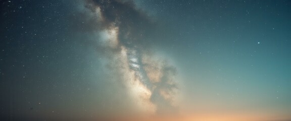 Poster - Celestial Wonder: The Milky Way's Ethereal Glow Across the Dusk Sky