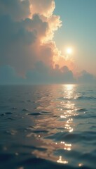 Aufkleber - Serene Ocean at Sunset with Sunlit Clouds Reflecting on Gentle Waves