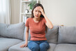 © Pormezz - Young Asian females feeling dizzy after standing too fast, have symptoms of low blood pressure
