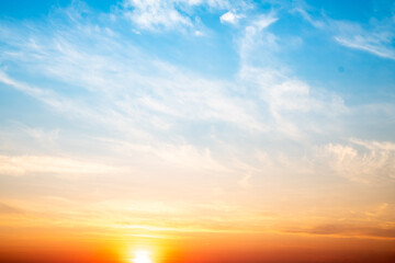 Wall Mural - beautiful , luxury soft gradient orange gold clouds and sunlight on the blue sky perfect for the bac