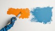 © SAQUEEN - Painting a wall with brush