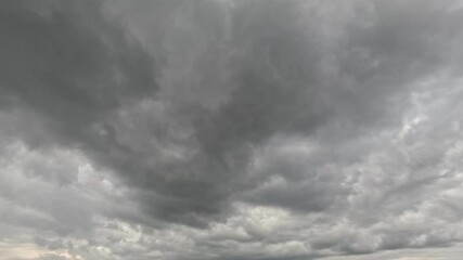 Wall Mural - Beautiful gray textured clouds on a cloudy day. Time-lapse mode.