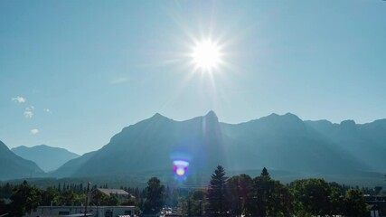Wall Mural - sky and mountain timelapse. a cloudy morning atmosphere in the summer season. natural landscape back
